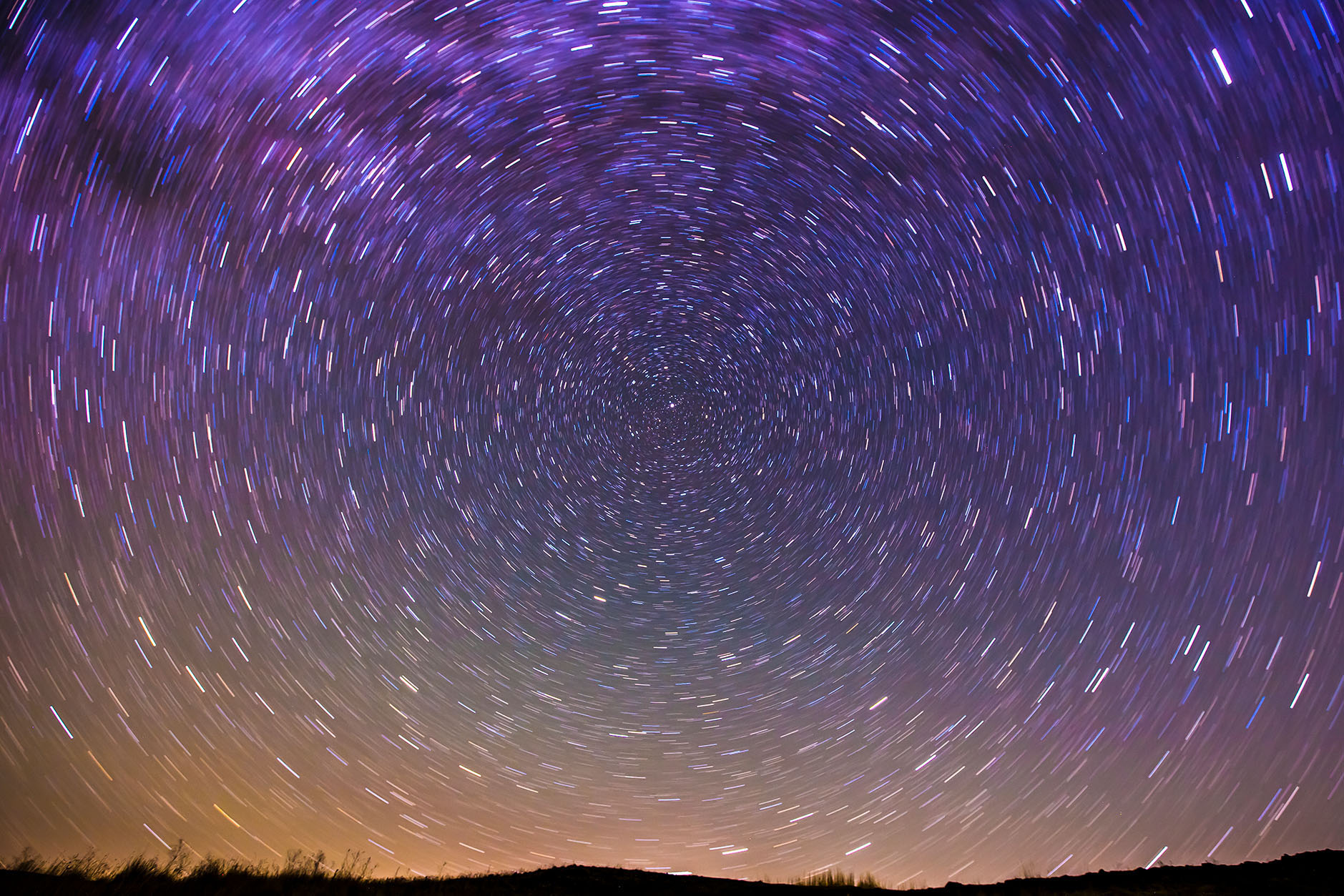 Stars blurred in the sky at sunset
