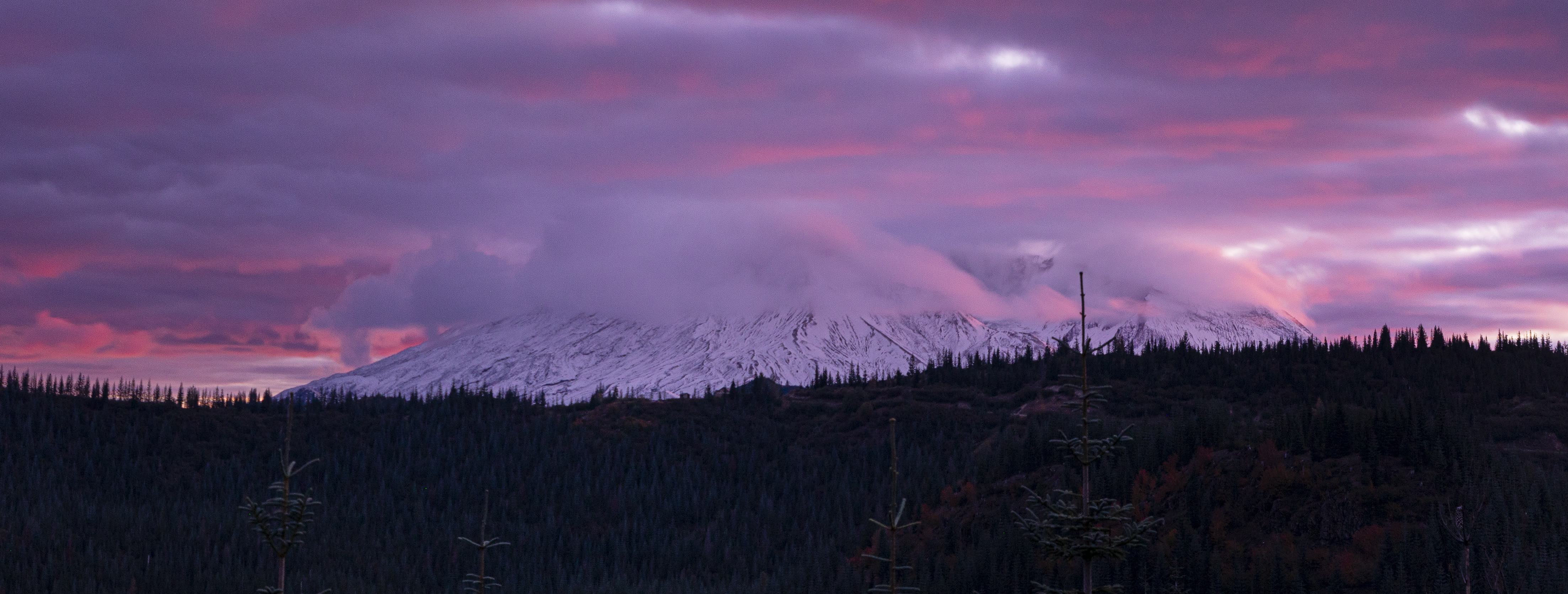 Mt. Rainier in the distance party covered in clouds